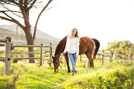 simsearch:6109-08398485,k - Young woman with her horse Foto de stock - Sin royalties Premium, Código: 6109-08398423