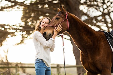 simsearch:6109-08398485,k - Young happy woman with her horse Foto de stock - Sin royalties Premium, Código: 6109-08398426