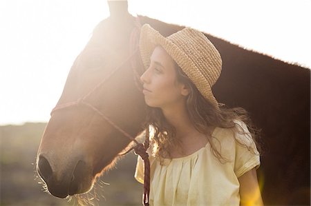 simsearch:6109-08398485,k - Young happy woman with her horse Foto de stock - Sin royalties Premium, Código: 6109-08398437