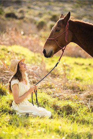 simsearch:6109-08398485,k - Young happy woman with her horse Foto de stock - Sin royalties Premium, Código: 6109-08398439