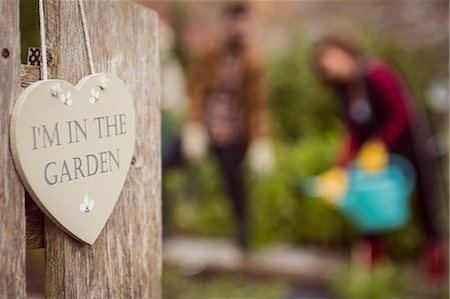 sign - Couple gardens in the background Stock Photo - Premium Royalty-Free, Code: 6109-08398975
