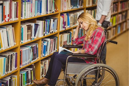 Student in wheelchair talking with classmate Stock Photo - Premium Royalty-Free, Code: 6109-08398918