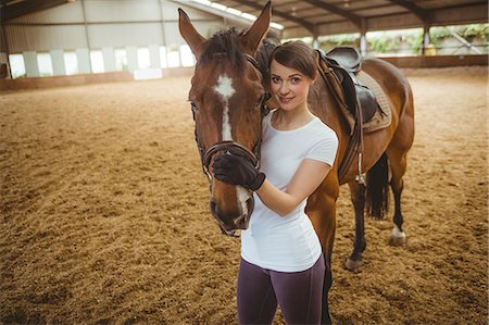 simsearch:6109-08399536,k - Female rider leading her horse Stock Photo - Premium Royalty-Free, Code: 6109-08399472