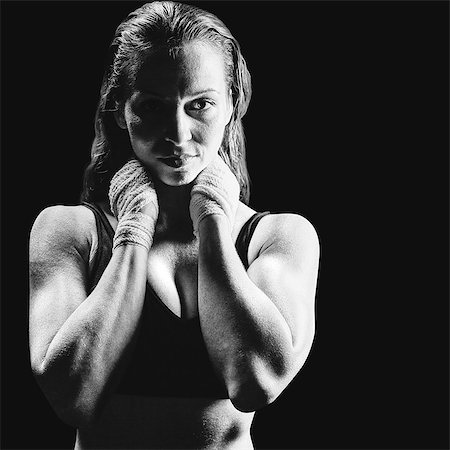 female fighter - Composite image of portrait of sexy athlete with hands around neck Photographie de stock - Premium Libres de Droits, Code: 6109-08399438