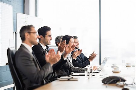 executives applauding - Business team having a meeting at the office Stock Photo - Premium Royalty-Free, Code: 6109-08488767