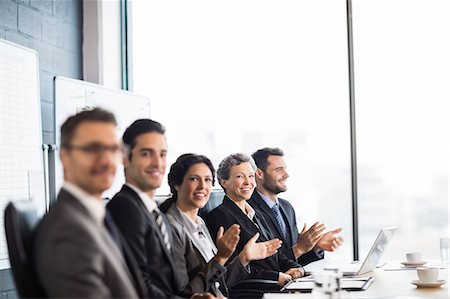 promoting - Business team having a meeting at the office Stock Photo - Premium Royalty-Free, Code: 6109-08488768
