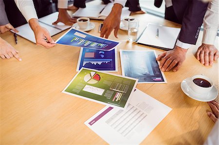 simsearch:6109-06781459,k - Business team having a meeting at the office Stock Photo - Premium Royalty-Free, Code: 6109-08488778