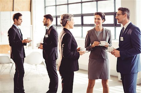 simsearch:6109-08488781,k - Business people meeting at conference at the office Stock Photo - Premium Royalty-Free, Code: 6109-08488848