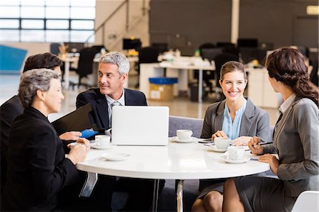 Business team having a meeting at the office Stock Photo - Premium Royalty-Free, Code: 6109-08488821