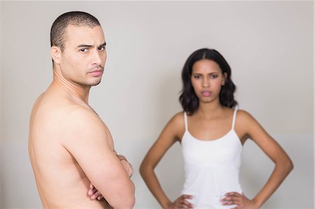 simsearch:6109-08435383,k - Unhappy young couple arguing in bathroom Stock Photo - Premium Royalty-Free, Code: 6109-08489230