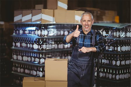 Happy brewer working in the plant at the local brewery Stock Photo - Premium Royalty-Free, Code: 6109-08489347