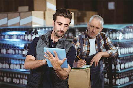 product photography alcohol - Team of brewers working together at the local brewery Stock Photo - Premium Royalty-Free, Code: 6109-08489390