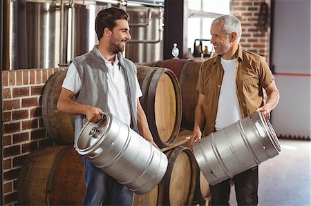 Team of brewers working together at the local brewery Stock Photo - Premium Royalty-Free, Code: 6109-08489403