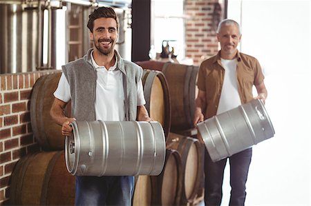 simsearch:6109-08489480,k - Team of brewers working together at the local brewery Stock Photo - Premium Royalty-Free, Code: 6109-08489404