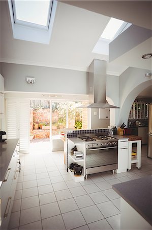 simsearch:6109-08488688,k - Kitchen in a large stylish home Stock Photo - Premium Royalty-Free, Code: 6109-08489798