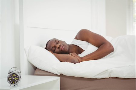 simsearch:6109-06781753,k - Handsome man sleeping in his bed Stock Photo - Premium Royalty-Free, Code: 6109-08435277