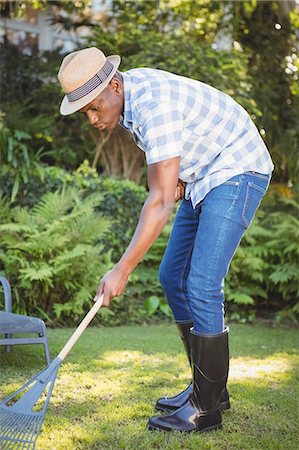 simsearch:6109-08435446,k - Handsome man doing some gardening outside Stock Photo - Premium Royalty-Free, Code: 6109-08435422