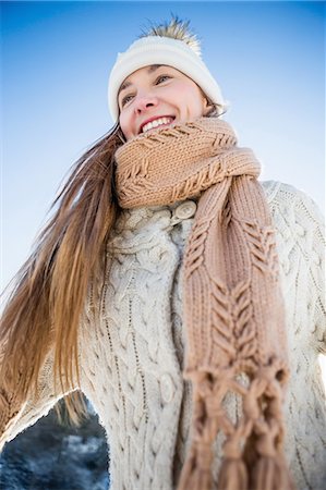 simsearch:6109-08435850,k - Smiling woman in winter clothes on a beautiful snowy day Stock Photo - Premium Royalty-Free, Code: 6109-08435879