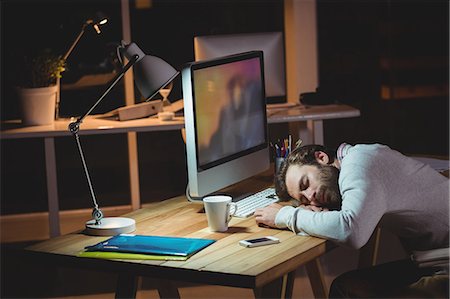 simsearch:6109-08581492,k - Sleeping businessman in his office Stock Photo - Premium Royalty-Free, Code: 6109-08581493