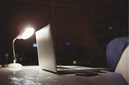 smartphone laptop - Technology devices on a desk Stock Photo - Premium Royalty-Free, Code: 6109-08581415