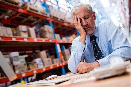 Anxious warehouse manager Stock Photo - Premium Royalty-Free, Code: 6109-08581657