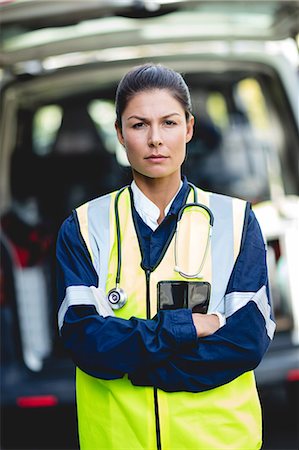 simsearch:6109-08689805,k - Portrait of ambulance woman Foto de stock - Sin royalties Premium, Código: 6109-08581866