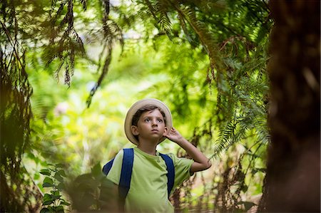 simsearch:400-06520162,k - Boy standing in forest Stock Photo - Premium Royalty-Free, Code: 6109-08581908