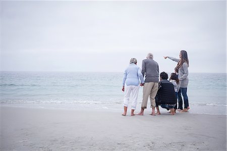 elderly parent with adult child - Family standing together and looking at sea Stock Photo - Premium Royalty-Free, Code: 6109-08536527