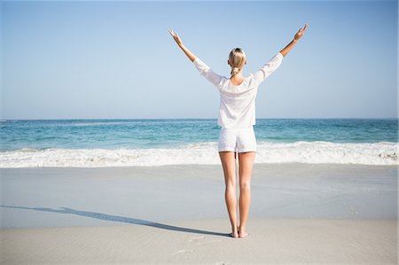 simsearch:6109-07496983,k - Blonde woman relaxing on the beach Stock Photo - Premium Royalty-Free, Code: 6109-08536735