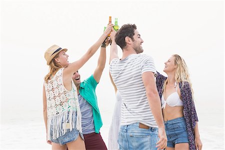 females posing together at the beach - Group of friends having a beer Stock Photo - Premium Royalty-Free, Code: 6109-08536868