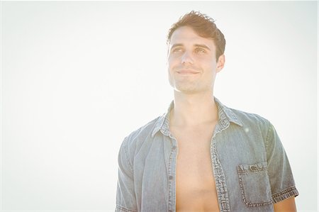 Fit man posing on the beach Photographie de stock - Premium Libres de Droits, Code: 6109-08536813