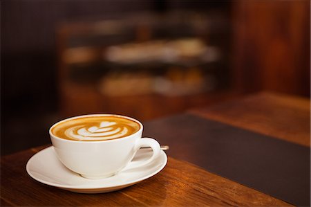 Cup of cappuccino with coffee art Foto de stock - Sin royalties Premium, Código: 6109-08536939