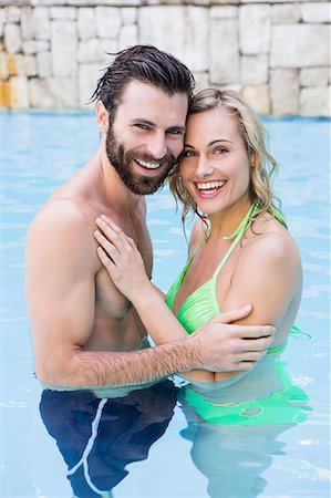 simsearch:6109-06195106,k - Couple embracing in swimming pool Stock Photo - Premium Royalty-Free, Code: 6109-08537400