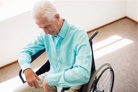 simsearch:6109-06004701,k - Senior man sitting in a wheelchair Stock Photo - Premium Royalty-Free, Code: 6109-08538315