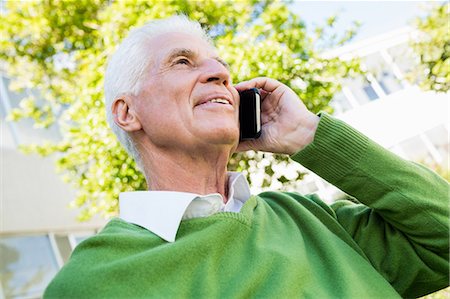 Senior man calling someone Stock Photo - Premium Royalty-Free, Code: 6109-08538462