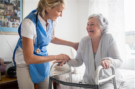 Nurse helping senior woman to stand up Stockbilder - Premium RF Lizenzfrei, Bildnummer: 6109-08538472