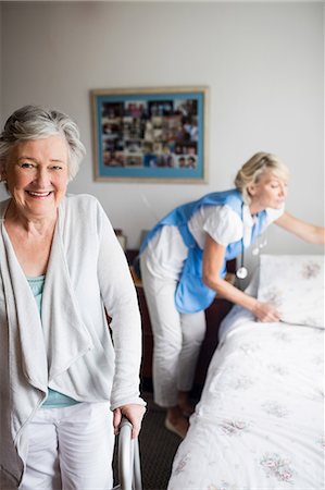 simsearch:6109-08538302,k - Nurse and senior woman are posing Stock Photo - Premium Royalty-Free, Code: 6109-08538477