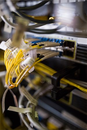 servidores - Close-Up of rack mounted server in server room Foto de stock - Royalty Free Premium, Número: 6109-08690060