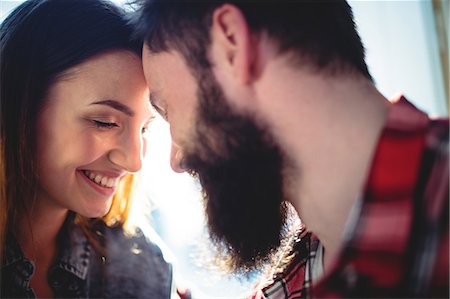 simsearch:6109-08690396,k - Close-u of happy young couple looking at each other in cafe Stock Photo - Premium Royalty-Free, Code: 6109-08690380