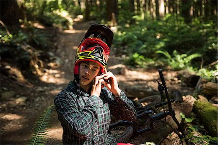 simsearch:6109-08764763,k - Male athletic wearing bicycle helmet in countryside Stock Photo - Premium Royalty-Free, Code: 6109-08764783