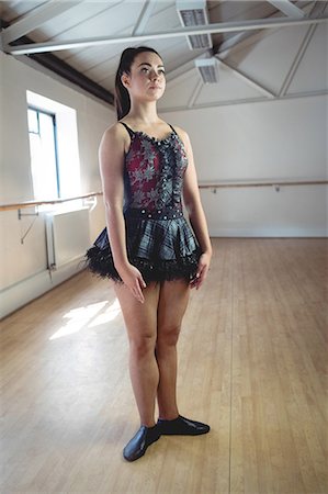 simsearch:6109-08803046,k - Ballerina practising ballet dance in the studio Stock Photo - Premium Royalty-Free, Code: 6109-08782849