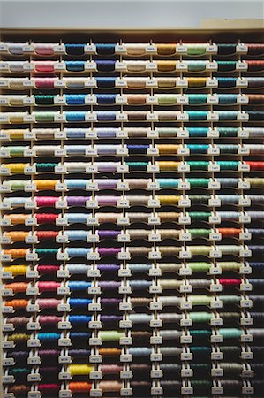 simsearch:6109-08701544,k - Colorful spools of thread in the box Stock Photo - Premium Royalty-Free, Code: 6109-08701542