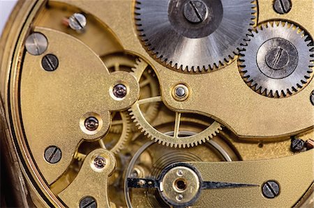 relojero (hombre y mujer) - Close-up of old pocket watch machine with gears Foto de stock - Sin royalties Premium, Código: 6109-08705174