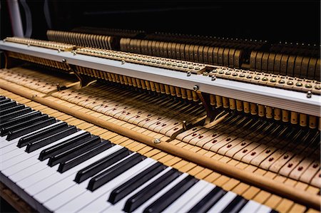 string instruments repair - Close-up of old piano keyboard at workshop Stock Photo - Premium Royalty-Free, Code: 6109-08720467
