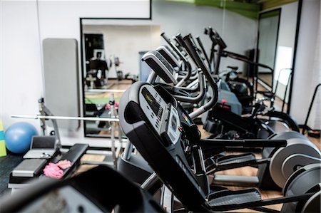 simsearch:6109-08765058,k - View of empty gym equipment in fitness studio Stock Photo - Premium Royalty-Free, Code: 6109-08739497