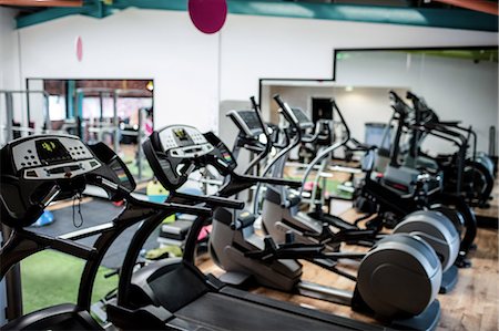 simsearch:6109-08765058,k - View of empty gym equipment in fitness studio Stock Photo - Premium Royalty-Free, Code: 6109-08739496