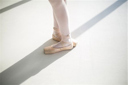 simsearch:6109-08802190,k - Low section of ballet dancers feet performing ballet dance in the ballet studio Stock Photo - Premium Royalty-Free, Code: 6109-08803046