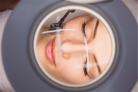 Dermatologist performing laser hair removal on patient face in clinic Stock Photo - Premium Royalty-Free, Code: 6109-08804019