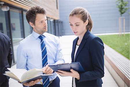 simsearch:6109-08804469,k - Businessman and colleague having discussion outside office building Stock Photo - Premium Royalty-Free, Code: 6109-08804240