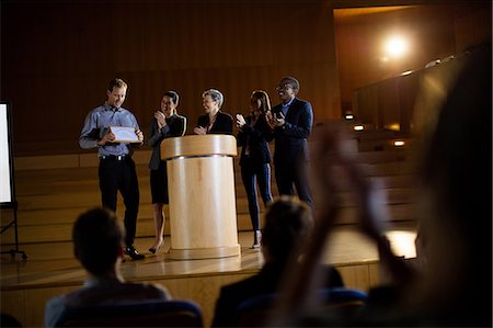 participating - Male business executive receiving award Stock Photo - Premium Royalty-Free, Code: 6109-08830479